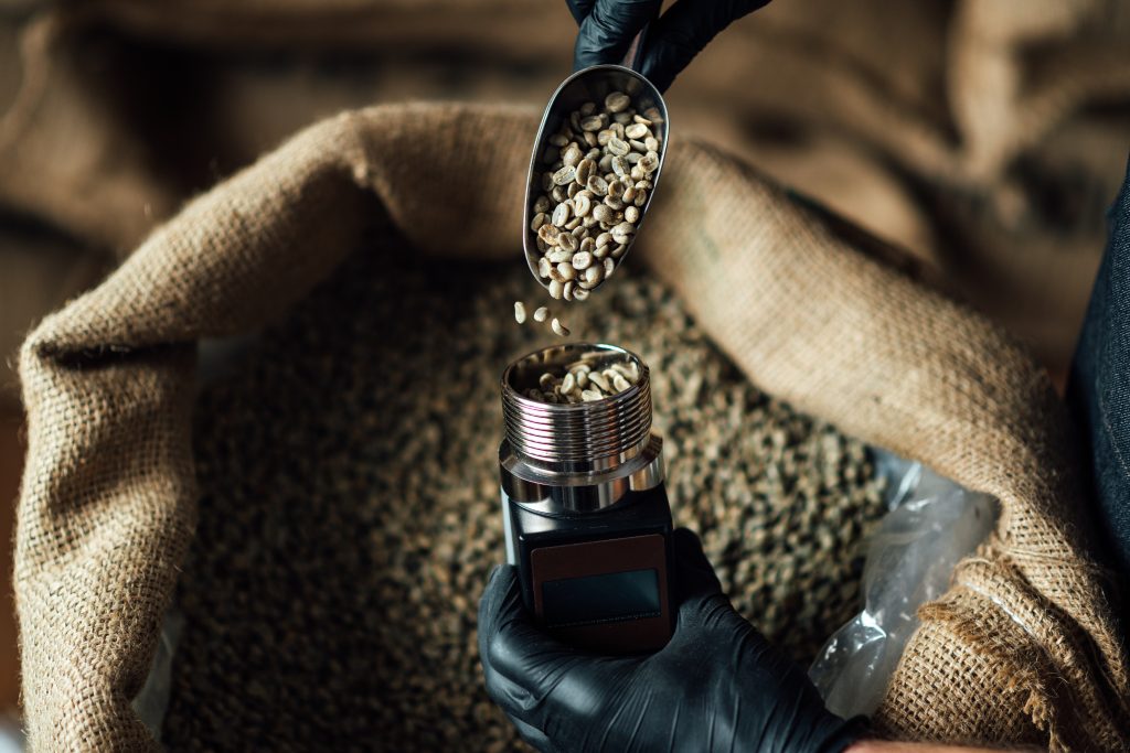 pouring-coffee-beans-into-a-moisture-measuring-dev-2021-08-27-10-00-07-utc-1024x683.jpg
