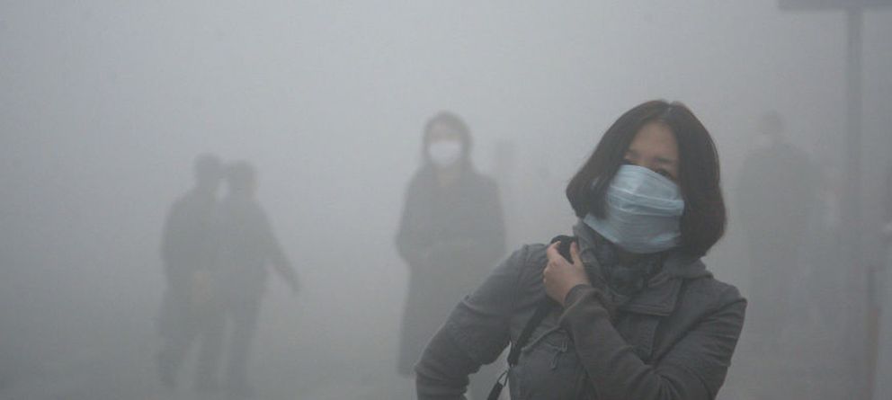 mujer polucion